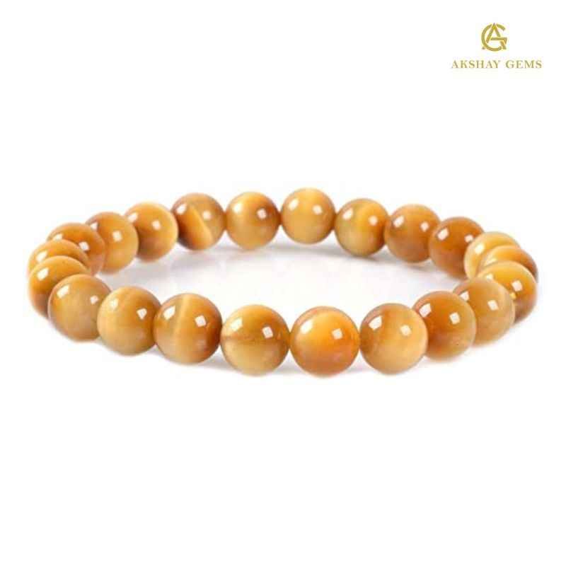50_f69e05a9-1672-4317-92e1-e202d2316fb2.jpg Gold Tiger Eye Bracelet - Image 1